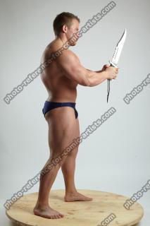 ADAM_WARD STANDING WITH KNIFE